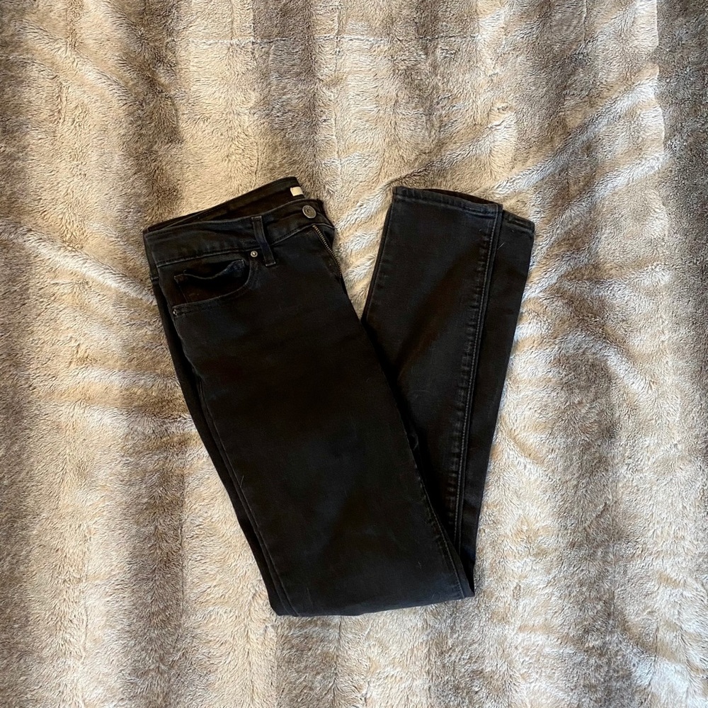 Levi’s 711 black skinny jeans in 28